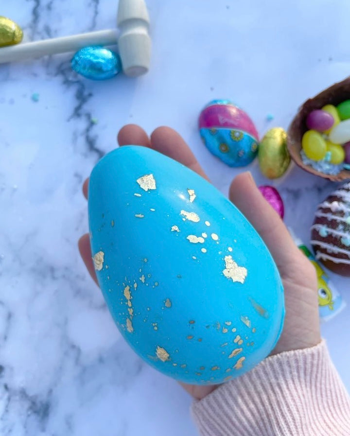 Mini breakable chocolate egg with surprises!